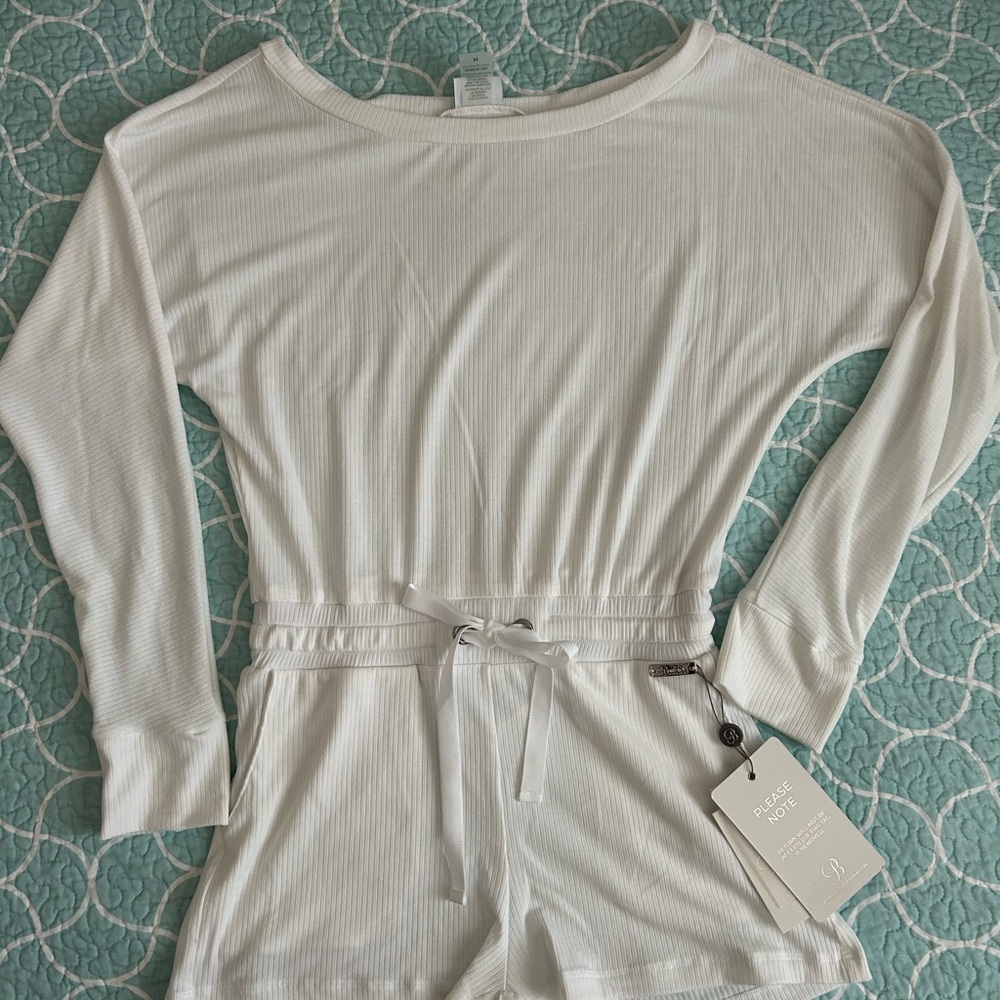 Elegant White Ribbed Bodysuit